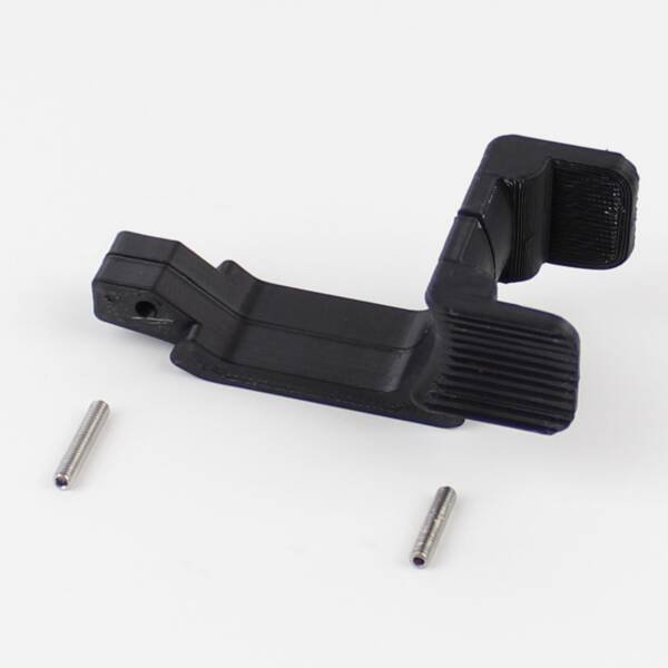 AR-15 Trigger Guard with attached ambidextrous finger rest.